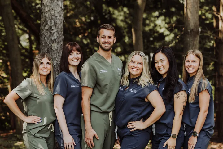 The full Ruther Health + Wellness team outdoors in Holland